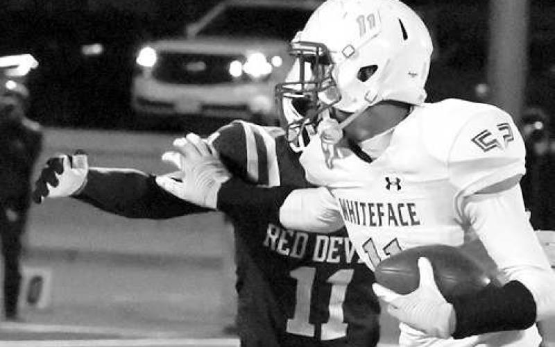 TD RECEPTION- Jeremias Chavez had four catches for 89 yards and a touchdown in a 70-24 loss to the no. 1 ranked Rankin Red Devils in the area round of the UIL Class 1A-1 high school playoffs last Friday. Whiteface finished their season at 9-3 with district and bi-district championships. (Photo Courtesy of Jay Kelley)