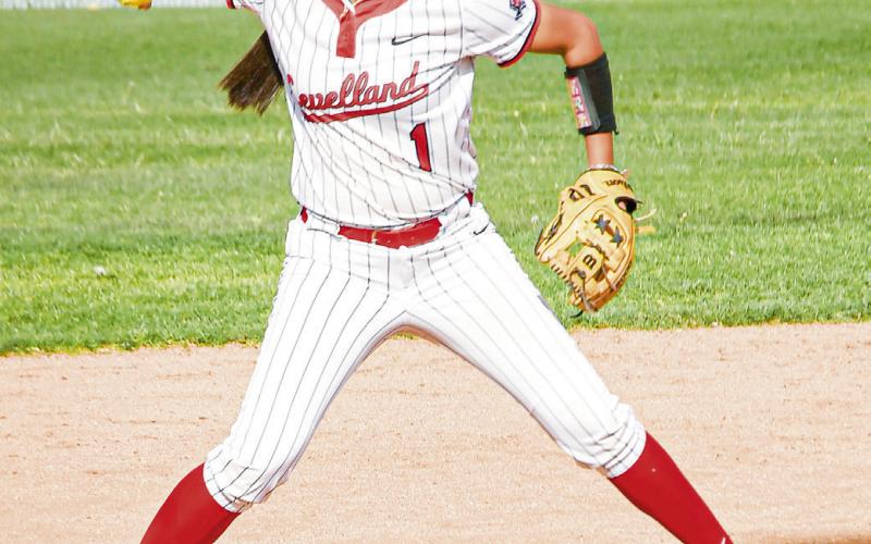 GET THE OUT - Levelland Loboette Madilyn Barrientes fields a groundball and makes the throw to get an out during their district softball game against Liberty this past Tuesday at Levelland High School. (Staff photo by Jentezen Smith)