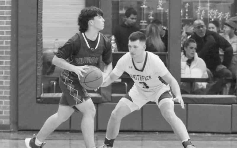 DEFENSE - Whiteface Antelope Ethan Kauffman guarded Sundown Roughneck Braiden Lara during the team’s district game against each other last Friday night. (Photo courtesy of Holly Crutcher)