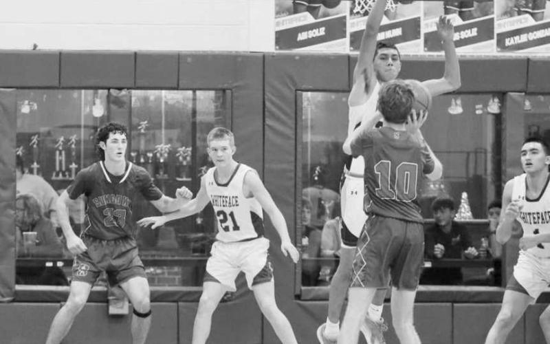 VERTICAL - Whiteface Antelope Isaak Soliz went vertical to block the Sundown Roughneck Isaiah Igo’s shot this past Friday at home during district play. (Photo courtesy of Holly Crutcher)