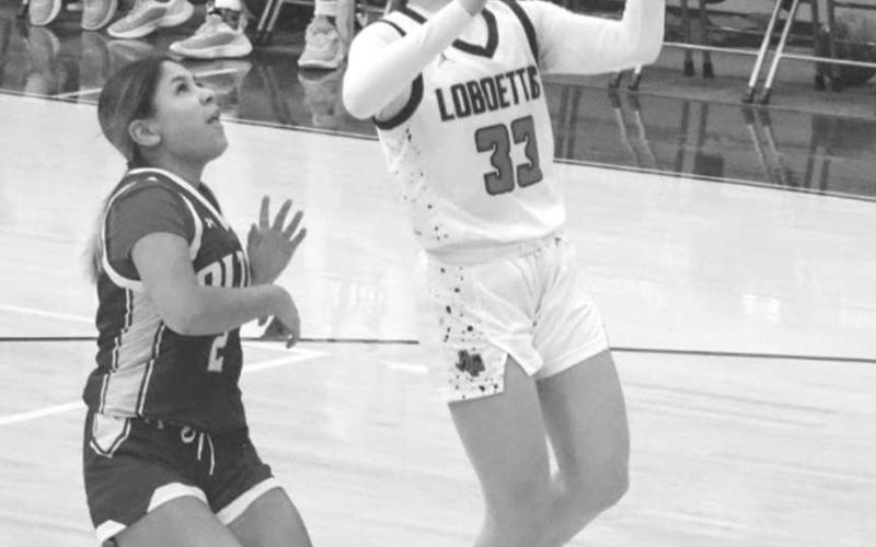 CANT CATCH ME - Levelland Loboette Presley Smith got loose on a Levelland fastbreak to get the team some much needed points in the teams win. (Staff photo by Aalijah Soliz)