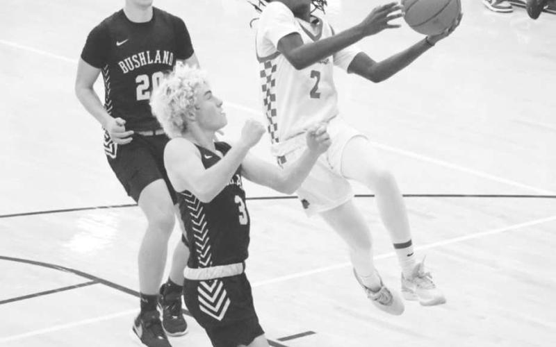 ATHLETIC - Levelland Lobo Elijah Jordan broke loose on a Levelland fastbreak against the Bushland Falcons to get the team some much needed points this past Friday. (Staff photo by Aalijah Soliz)