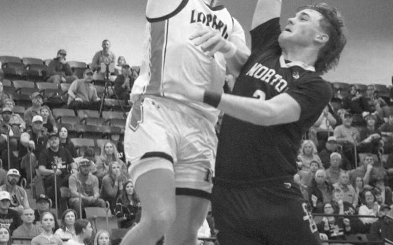 NO EASY SHOTS - Morton Indian Lane Lyon went vertical to block the shot in the team’s last game against the New Home Leopards at Levelland High School. (Staff photo by Aalijah Soliz)
