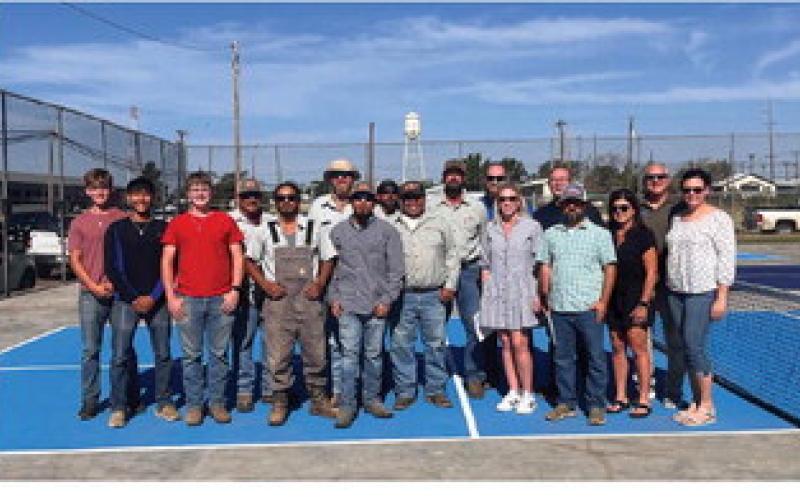 Below: Members of the Levelland City Council, Levelland Community Development Corporation and City Parks Department pose during the Grand Opening of the new Pickleball Court!