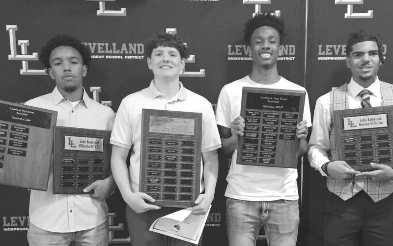 LOBO BASKETBALL - Levelland Lobos Jayden Castillo earned Offensive MVP, Eryk Jones earned Defensive MVP, Graham Gibbs earned Gano Tubb Award and Sean Landrum earned New Comer of the Year Award. (Photo courtesy of Levelland ISD)
