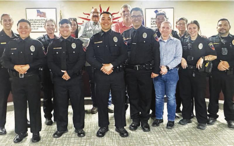 WELCOME ABOARD! - The Levelland Police Department welcomed four new officers to their ranks last week. Pictured front and center is Officer Guerrero, Officer Salinas, Officer Lazcano and Officer Corely. Officers Guerrero, Salinas and Lazcamo were issued their Oath of Office courtesy of Municipal Court Judge Esmeralda Rowand while City Secretary Andrea Corley issued the Oath of Officer to her husband Officer Corley. (Staff photo by Hannah Woodrum)