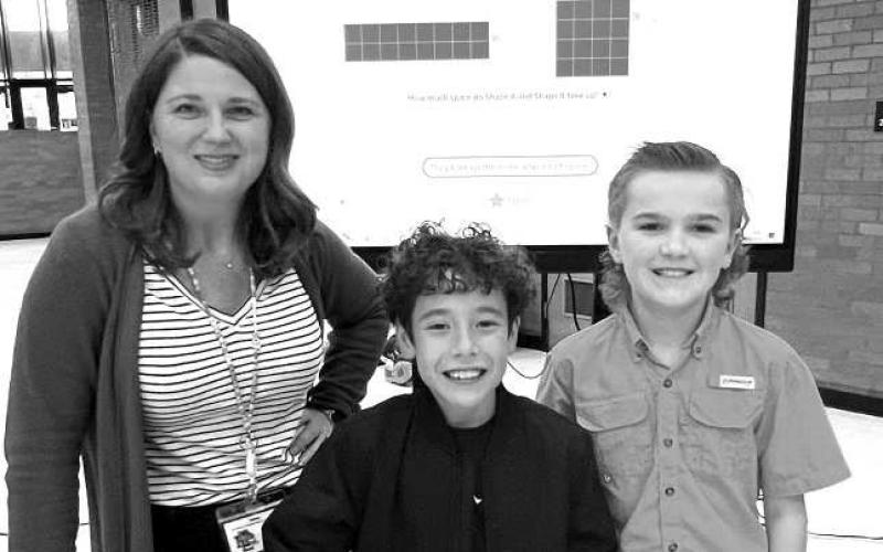 TECHNOLOGY EXPO-The LISD Technology Department hosted a Technology Expo earlier this evening to end our focus on CTE Month. A big crowd came out. LISD educators and students showed parents all the things that they are learning through technology, all the things they can do with technology, and all the things that technology is doing to help them be successful after high school. In photo are South 3rd Grade Teacher Christine Martin,Trace Gavina and Rayden Smith.(Photo submitted by Cristal Isaacks)