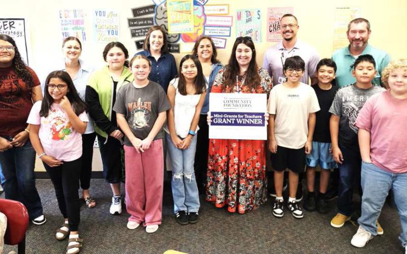 COMMUNITY FOUNDATION OF WEST TEXAS GRANT - LMS | Alison Dawn — Literacy Lab. Dawn received a generous grant to create a Literacy Lab in her classroom, providing students with engaging resources and opportunities to strengthen reading, comprehension and literacy skills. Shown are representatives, assistant principals Mandy Leach and Brad Brunson, principal Jason Atcheson, Dawn and her class.