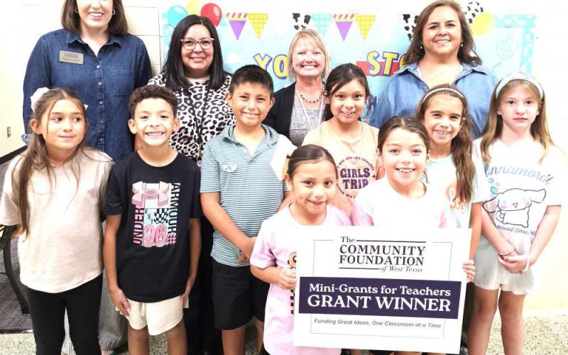 COMMUNITY FOUNDATION OF WEST TEXAS GRANT - South | Tiffany Harkins — Marty the Robot. Harkins' grant will bring Marty the Robot to South, giving students an exciting, hands-on way to explore coding, robotics, problem-solving and STEM concepts. Shown are assistant Principal Gracie Ruiz with librarian Tiffany Harkins and Brighton Flores, Isaiaz Venegas, Hunter Austin, Camila Marinelarena, Ava Pompa, Claire Sanbothe, Kynslie Perez and Lyla Nino.