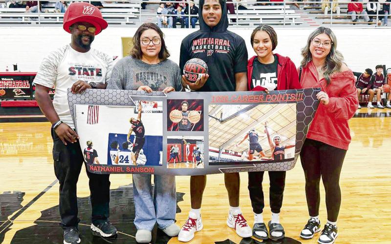 1,000 CAREER POINTS FOR SANSOM - Whitharral senior center Nathaniel Sansom scored his 1,000th career point during their basketball game against Roosevelt on Nov. 25 at Whitharral High School. The Panthers would win the game 60-43 and move to 1-1. (Photo provided by Pete Christy Facebook)