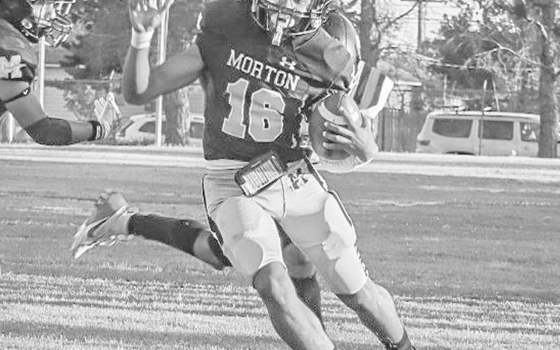 CLOSE CALL - Morton Indian Brayden Villarreal ran down the sideline narrowly staying inbounds this past Friday during the team’s homecoming game against the Slaton Tigers. (Staff photo by Aalijah Soliz)