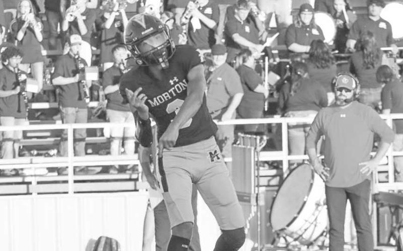 CLEAN POCKET - Morton Indian A.J. Mendoza threw the ball with a clean pocket to his receiver this past Friday at home against Slaton. (Staff photo by Aalijah Soliz)