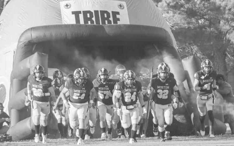 GAME TIME - The Morton Indians ran out of their tunnel this past Friday to start their game against the Slaton Tigers at home. (Staff photo by Aalijah Soliz)