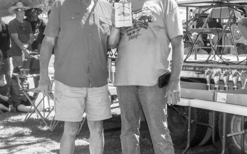 CHOICE OF SHOW - The West Texas Oldies Club choice of show went to Rockey Sheppard. The award was presented by R.H. Reaves at the Thunder on the Plains Car Show on Saturday at the Levelland City Park. (Photo courtesy of Emily Campos)