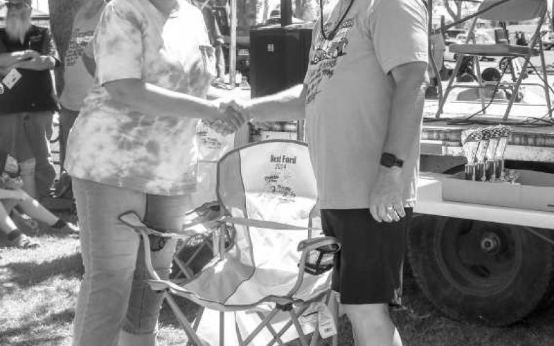BEST FORD - Pictured is Dawn Chancy who won Best Ford at the Thunder on the Plains Car Show on Saturday at the Levelland City Park. Chancy won $100 dollars and a lawn chair with her 1966 Ford Bronco. (Photo courtesy of Emily Campos)