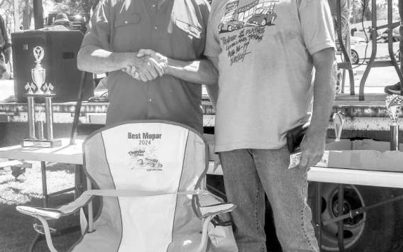 BEST MOPAR- Pictured is Rocky Sheppard who won the Best Mopar Award which was presented by R.H.Reaves at the Thunder on the Plains Car Show on Saturday at the Levelland City Park. Sheppard won $100 dollars and a lawn chair with his 1969 Plymoth GTX. (Photo courtesy of Emily Campos)