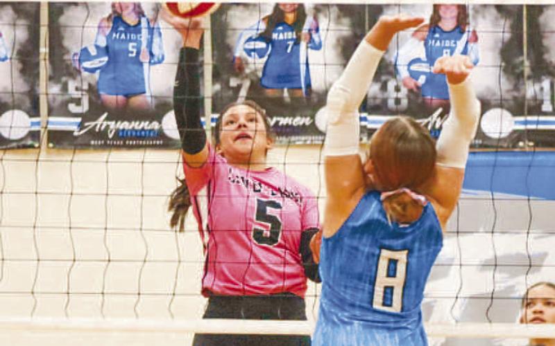 SWEEP - Levelland Loboette Allison Monge tipped the ball over the net against the San Angelo Lake View Maidens this past Tuesday on the road in their district matchup. (Staff photo by Aalijah Soliz)