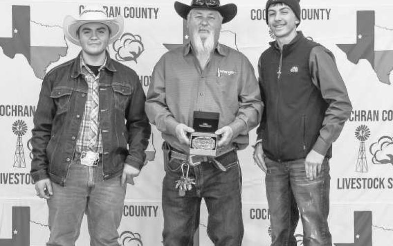 RESERVE GRAND CHAMPION AGMECHANICS - AJ Mendoza and Zahir Fierro were presented a buckle donated by Chip Bilbrey and presented by Billy Joe Roberts at the Cochran County Livestock Show. (Staff Photo by Essence Childers)