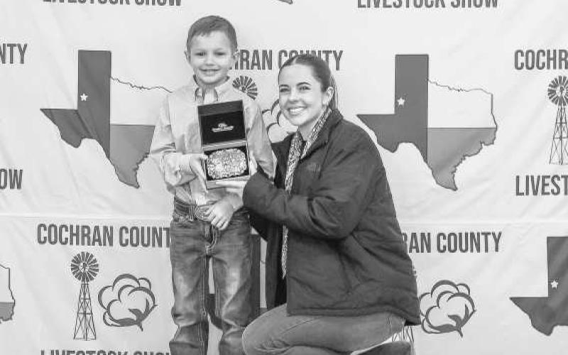 JUNIOR LAMB SHOWMAN- Ransom Franklin received a buckle donated and presented by Ayres Farms last Saturday at the Cochran County Livestock Show. The Livestock show was held at the County Barn in Morton. (Staff Photo by Essence Childers)