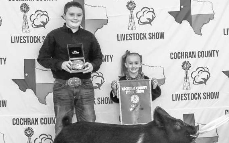 AWARD WINNERS-- Mason Albus and Adalyn Kerby was presented with several buckles and awards at the Cochran County Stock Show on Saturday. The event was held at the County Show Barn in Morton. (Staff Photo by Essence Childers)