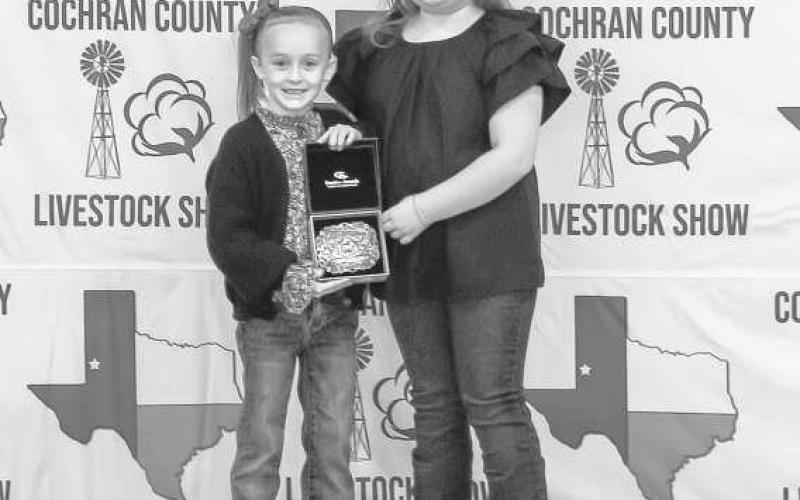 GRAND CHAMPION GILT- Adalyn Kerby was awarded a buckle donated and presented by Clark Cattle at the Cochran County Livestock Show held at the County Show Barn in Morton. (Staff Photo By Essence Childers)