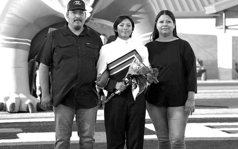 SENIOR BAND - Levelland seniors were recognized last Friday during the Lobo football home game against the Borger Bulldogs. Senior Evalyn Jasso was escorted by her parents Lupe and Maria Jasso. (Staff Photo by Dom Puente)