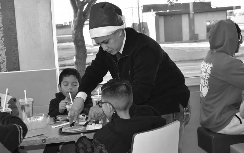 PANCAKE BREAKFAST - Local law enforcement personnel helped serve children breakfast at McDonald’s last Saturday as part of the the Blue Santa Event that hosted 29 children from the Levelland area. (Staff photo by Emily Campos)