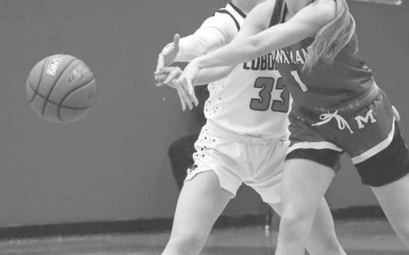 STEAL - Levelland Loboette Presley Smith pressed the defense to force a turnover in the girls win. The Loboettes next game will be against the Big Spring steers for the district opener. (Staff photo by Aalijah Soliz)