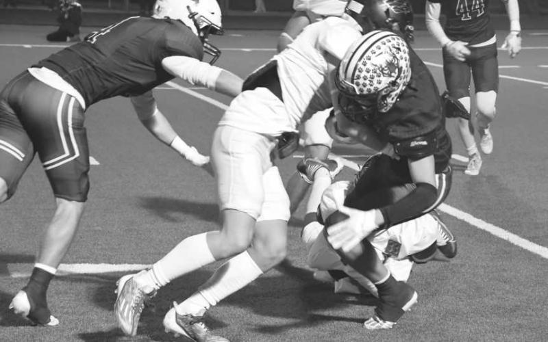 TAKE DOWN - Brolin Kennedy had five tackles for the Whitharral Panthers against the Klondike Cougars in a 64-16 UIL 1A-2 High School Football Area Round loss last Friday in Hermleigh. The Panthers finished their season at 9-2. (Staff photo by Jay Kelley)