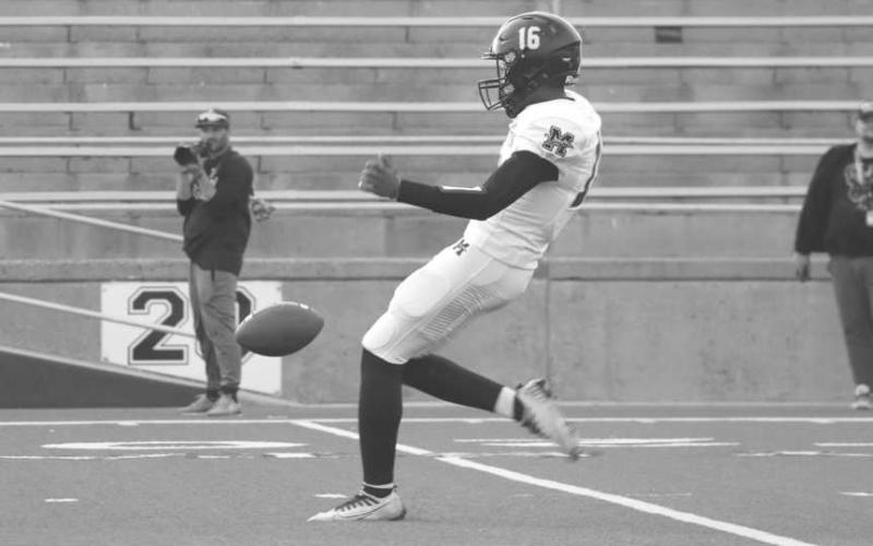 PUNT - Morton Indian Brayden Villarreal punted the ball against the Wellington Skyrockets in the teams loss at Happy State Bank Stadium in Canyon. (Staff photo by Aalijah Soliz)