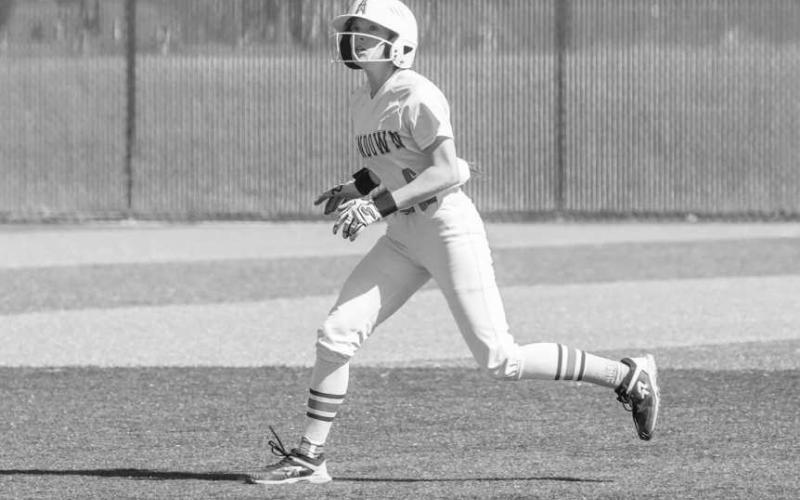 SMART BASERUNNING - Pictured is Roughette Emry Jourden tracking a fly ball while at second base during their matchup against the Tahoka Lady Bulldogs Tuesday. The Roughettes look to remain unscathed in district play after reaching a 3-0 record. The Roughette’s will have to be road warriors as their next three games are on the road in Post, Seagraves and Tahoka. (Photo courtesy of Sundown ISD)