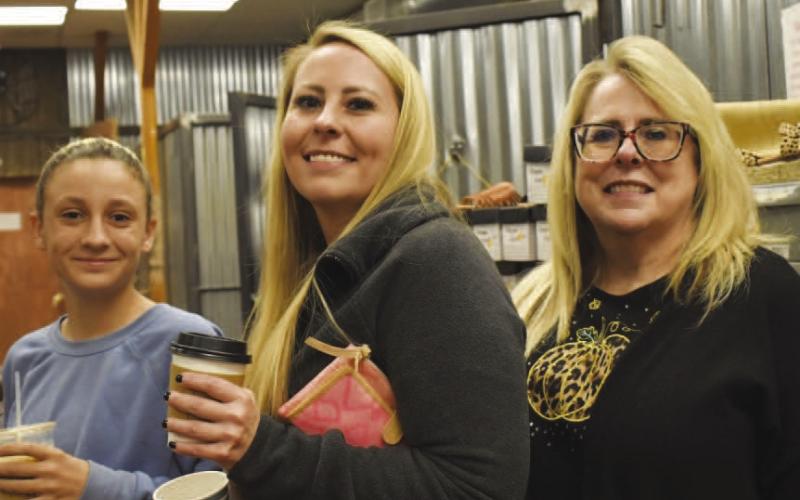 OUR STUFF FUN - Shop til you drop was the on going theme for the ladies enjoying Ladies Night Out in downtown Levelland. Skylar Wiseman, Jessica Greene &amp;amp; Sonya Herring paused their shopping spree to pose for a group photo in the Our Stuff store on the sqaure. (Photo courtesy of Delany Jackson)
