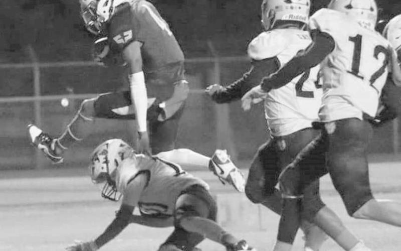 QUICK HURDLE - Jeremiah Rendon had 108 yards and three touchdowns on six carries to help the Whiteface Antelopes to a 68-0 home win in their UIL District 3-1A1 high school football home opener against the Wellman-Union Wildcats. The Antelopes took on the Meadow Broncos this past Friday on the road. (Photo by Holly Crutcher)