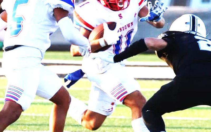 Sundown Roughneck Jose Aleman drives with the ball facing the Buffalo defense. (Sundown ISD photo)