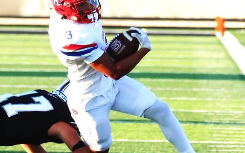 S undown Roughneck dodges tackle by Buffalo defense. (Sundown ISD photo)