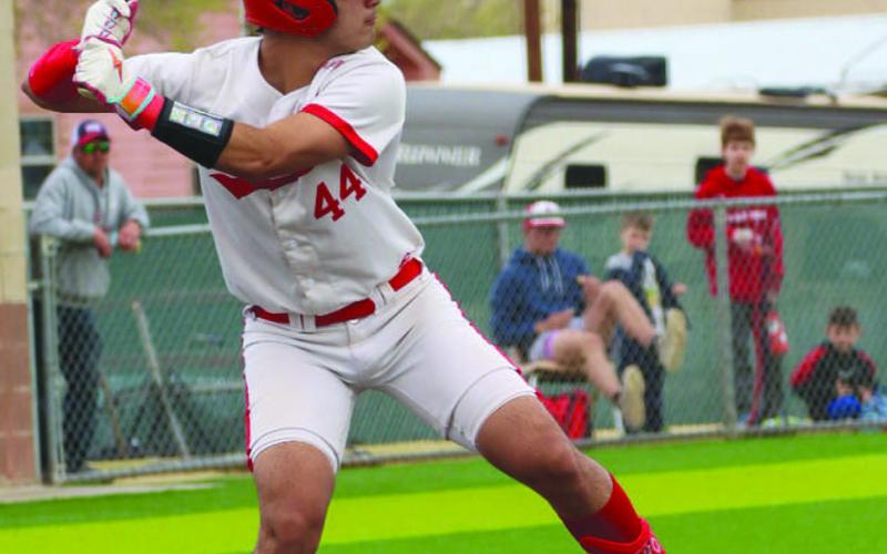 POWER SWING - Sundown Roughneck Jaxon Rodriguez got ready to swing at the fast ball during the team’s game against Tahoka this past Friday at home. The Roughnecks took the win from the Bulldog’s, 1612. (Staff photo by Aalijah Soliz)