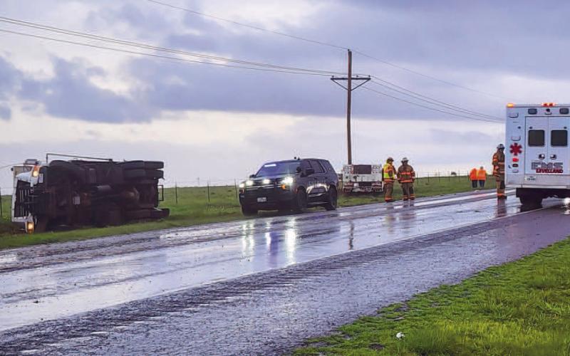 MORNING ROLLOVER - Hockley County Sheriff’s, Levelland EMS, Levelland Fire Department and the Texas Department of Transportation responded to the scene of a one-vehicle crash. The fire departments report states a dump truck rolled over near State Highway 114 and FM 303, Thursday around 9:20 a.m. The occupants of the dump truck were able to exit the vehicle and declined medical transportation. The cause of the crash has not been released. (Staff Photo by Dom Puente)