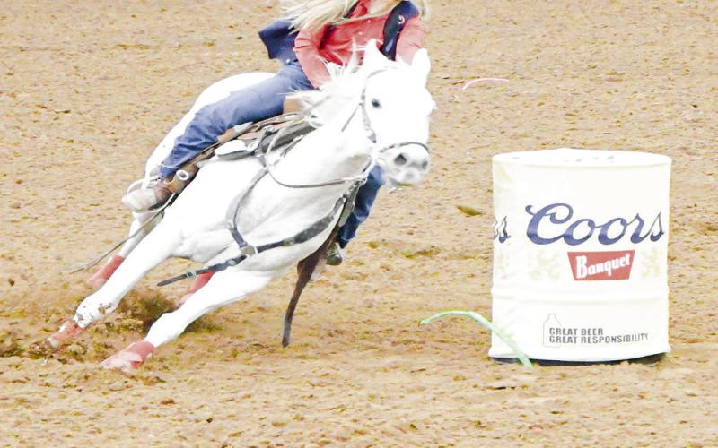 BARREL RACING - SPC’s Keely Pharr competes in the barrel racing during the SPC Rodeo at the Mallet Event Center &amp;amp; Arena this past Saturday. (Staff photo by Jentezen Smith)