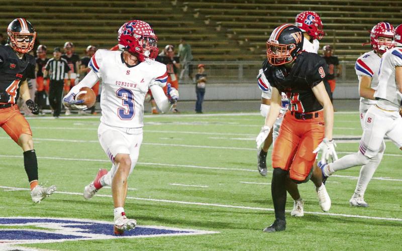 LEADING RECEIVER - Sundown senior wide receiver Coen Nevarez goes to make a play during their playoff football game against Wink this past Thursday night. Nevarez would lead the Roughnecks in receiving with 35 yards on two receptions. (Photo provided by Sundown Roughnecks Facebook)
