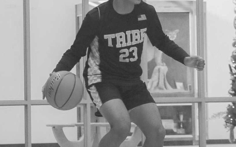 READ THE DEFENSE - Morton Indian Brayden Villarreal read the defense while bringing the ball up the court during the team’s game against Klondike. (Staff photo by Aalijah Soliz)