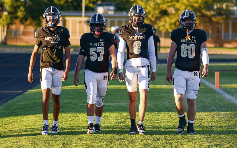 PREGAME COIN TOSS - Morton football senior team captains walk out towards the pregame coin toss before their game against Ralls this past Friday night at Indian Stadium. Pictured from left to right is EJ Rivas, Adrian Luevano, Jaeden Alvarado and Britton Boggs. They would help lead Morton to a 33-6 victory, earning their first win of the season. (Staff photo by Jentezen Smith)
