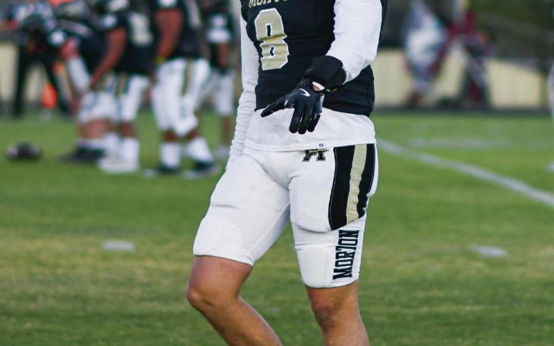 AM I ON? - Senior wide receiver Jaeden Alvarado checks with the ref if he’s on the line of scrimmage during Morton’s game against Ralls this past Friday night at Indian Stadium. (Staff photo by Jentezen Smith)