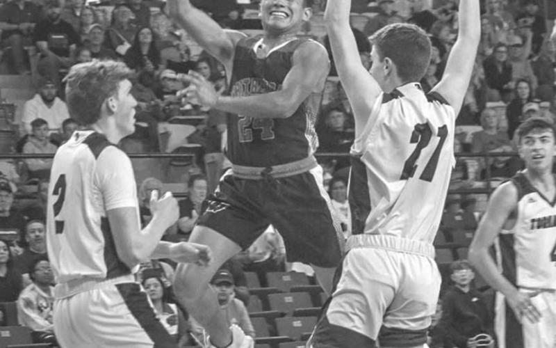 HIGH RISER - Whitharral Panther Nomar Gomez rose over the defense during the team’s last game against the Texline Tornadoes last Friday at South Plains College. (Staff photo by Aalijah Soliz)