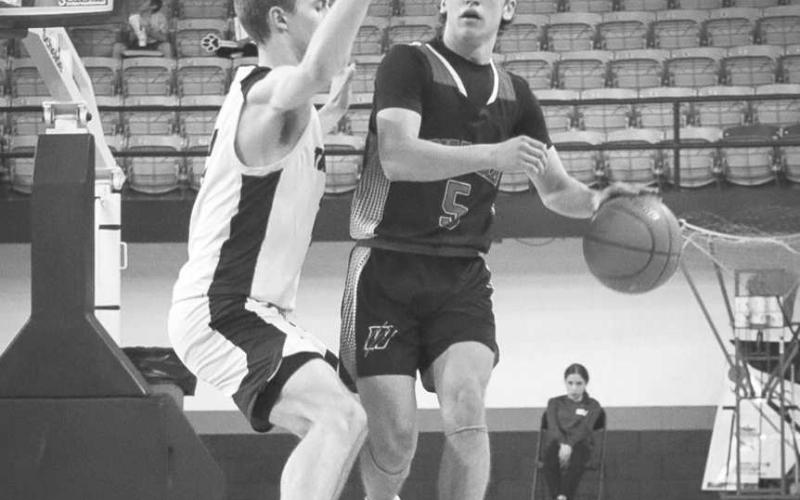 SECURE - Whitharral Panther Jack Griffin brough the ball up the court this past Tuesday in the team’s last game against the Texline Tornadoes. (Staff photo by Aalijah Soliz)