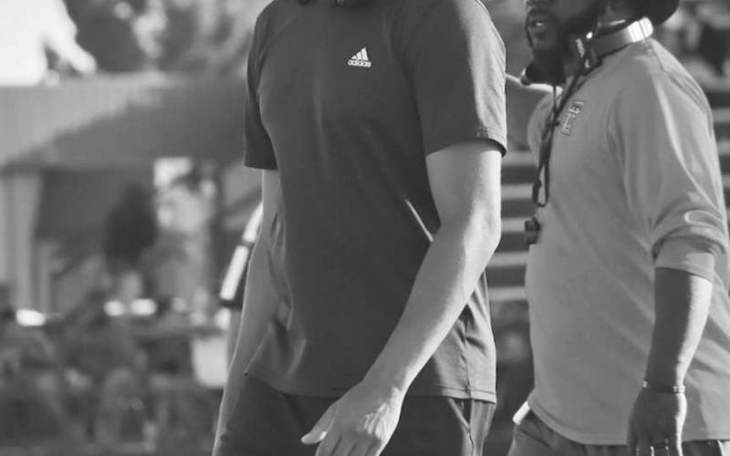 HEAD COACH - Levelland Head Football Coach and Athletic Director Lyle Leong walked to the sideline after talking to his players this past Thursday during the team’s scrimmage against the Big Spring Steers. (Staff photo by Aalijah Soliz)