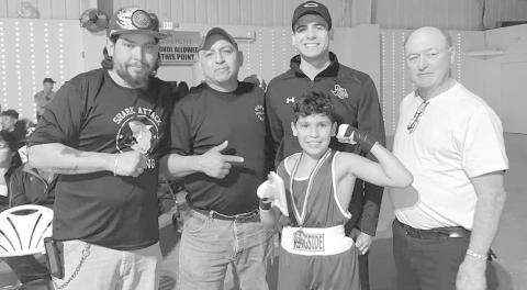 GOLDEN GLOVES- The Levelland Boxing Center Shark Attack Boxing Team competed in the Lubbock Regional Golden Gloves Tournament February 18th and 19th. Damian Nieland and Enriquiz Olivas won unanimous decisions. Jeremy Phelps lost a split decision. Nieland will compete at the state championship March 14th-18th in Fort Worth, Texas. Coaches for Shark Attack Boxing are: Carlos Olivas, John Espinoza and Sharky Lecroy. (Photo Courtesy of Sharky Lecroy)