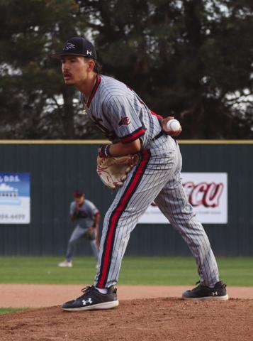 AT THE MOUND - Levelland Lobo Boston Winfield read his teammates signs during the teams game against the Sweetwater Mustangs last Friday at home. (Staff photo by Aalijah Soliz)