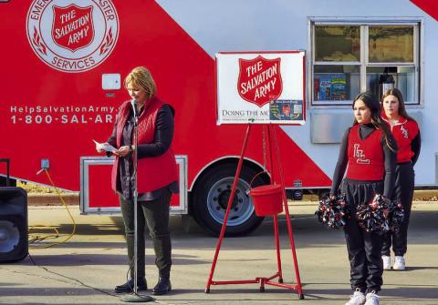 SEASON OF GIVING - The Hockley County Salvation Army unit hosted their annual Red Kettle Kick-Off Tuesday afternoon at the United Supermarket parking lot in Levelland. Levelland ISD School Board Vice President DeEtte Edens spoke to the crowd in attendance talking about the Salvation Army and how community members can volunteer their time this holiday season. (Staff photo by Dom Puente)