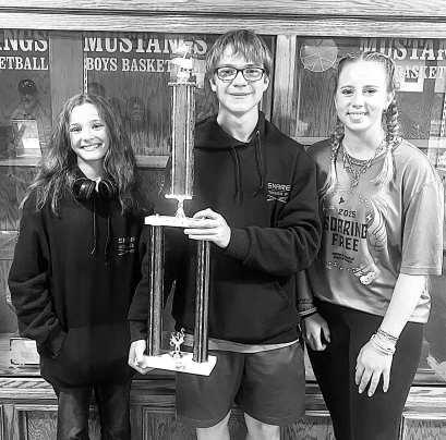 Ropes band director is Nora Brazil. Ropes High School band students Millie Sisson, Tanner Fair and Kyleigh Becton, members of the drumline and front ensemble show off the trophy after competing for their first time at the West Texas Auxiliary Championships (WTAC) where the band won first place for the 2A division.