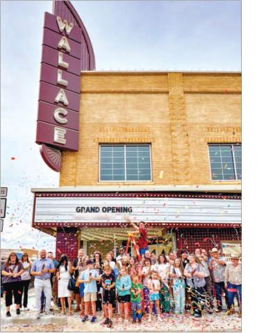 HISTORIC REOPENING SET - The Wallace Theater Board has announced the Wallace will be reopening Saturday, September 20. A small gathering was held in front of the Wallace Theater this past week celebrating the announcement. Pictured are those in front of the Wallace Theater who have been part of or have supported the revitalization of the Wallace Theater. (Photo courtesy of the Wallace Theater)